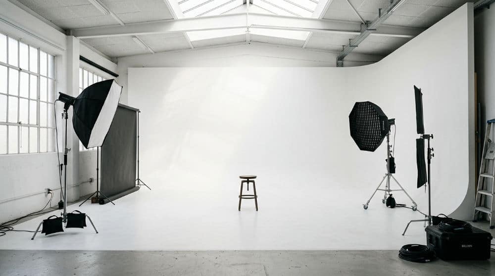A clean white cyclorama wall at Lightz Out Studios in San Diego prepared for a professional portrait session.