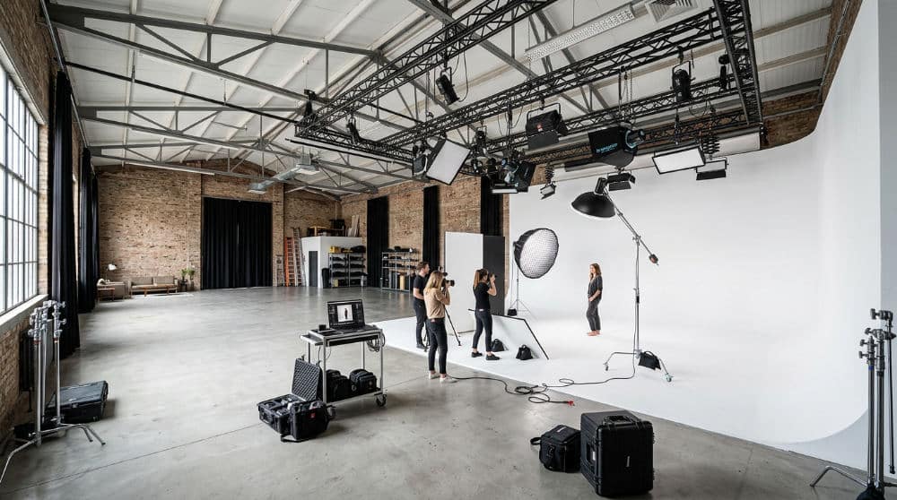 The expansive interior of Lightz Out Studios in San Diego featuring a professional cyclorama wall setup.