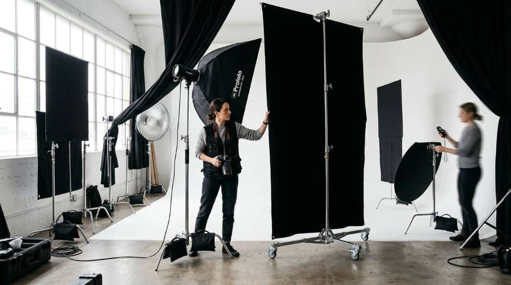 High contrast studio lighting setup with cyclorama wall