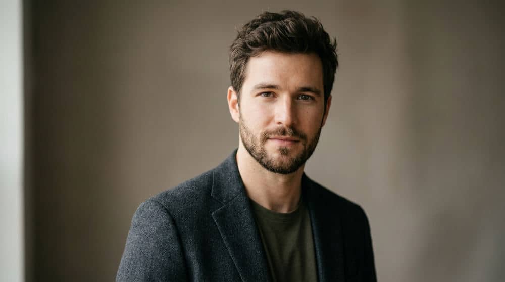 A tight frame model headshot showing natural facial features and clean skin for an agency portfolio.